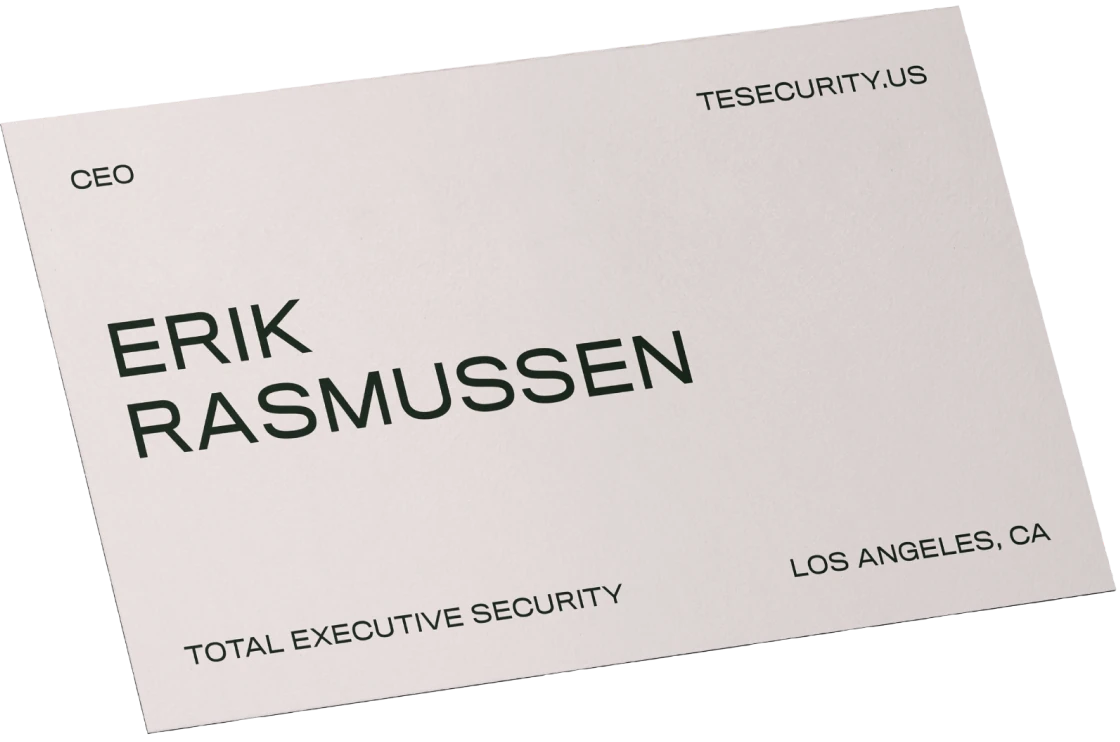 Business card with the text 'Erik Rasmussen, CEO, Total Executive Security' and details like company website and location.