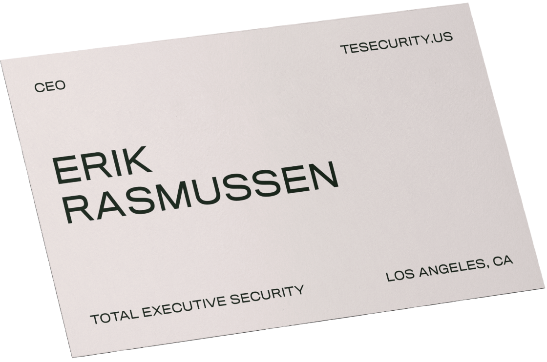 Business card with the text 'Erik Rasmussen, CEO, Total Executive Security' and details like company website and location.